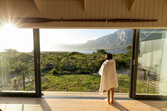 South Africa, Stanford, Boy (10-11) looking at lagoon and Klein mountains
