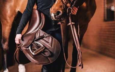 Horse Rider with Brown Leather Saddle - 568896739