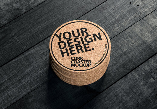 Stack of Round Cork Coaster Mockup on the black wooden table