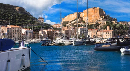 Foto op Canvas Bonifaccio town, Corsica island. view of marina with sailing boats and castle. popular tourist destination © Freesurf