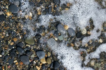 Wet stones and sea foam