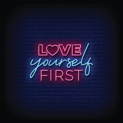 Neon Sign love yourself first with brick wall background vector