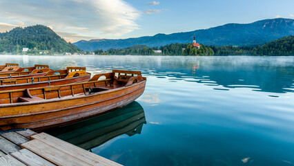 Church on island, lake and mountains background at Bled, Slovenia