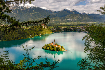 Church on island, lake and mountains background at Bled, Slovenia