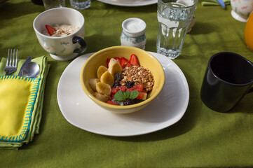 Healthy granola breakfast bowl with fruit