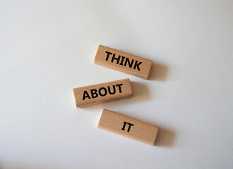 Think about it symbol. Wooden blocks with words Think about it. Beautiful white background. Business and Think about it concept. Copy space.