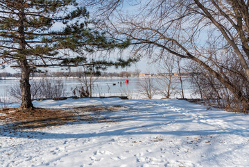 Ice Fishing On Fox River At De Pere, Wisconsin, In Early February
