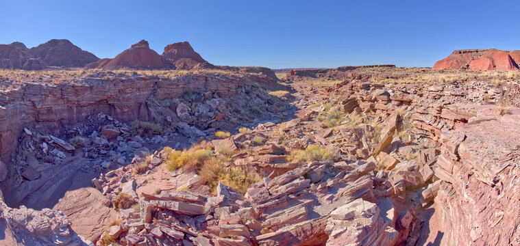 View of Tiponi Gap in the distance from the dry cliff of Tiponi Gap Falls in Petrified Forest National Park Arizona.