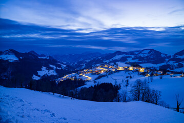 mountain landscape near the village of maria neustift in upper austria on an evening in winter
