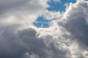 Fototapeta premium Beautiful huge fluffy clouds on the blue sky. Sky clouds background.