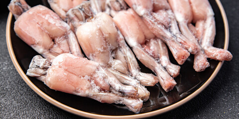 frog leg frozen meat frozen food meal food snack on the table copy space food background rustic top view