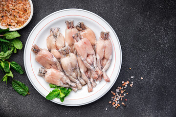 frog leg frozen meat frozen food meal food snack on the table copy space food background rustic top view