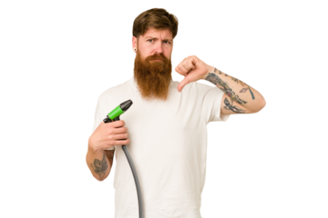 Adult man holding a watering hose isolated feels proud and self confident, example to follow.