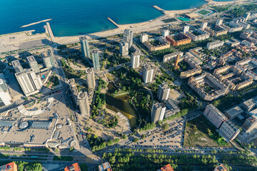 Aerial view of the maritime zone of Barcelona cityscape from helicopter. top view, Sant Marti...