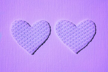 cute pink heart made of textured material on table