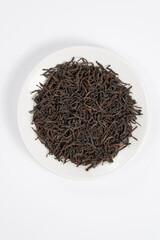 Fototapeta premium Black tea top view on white background