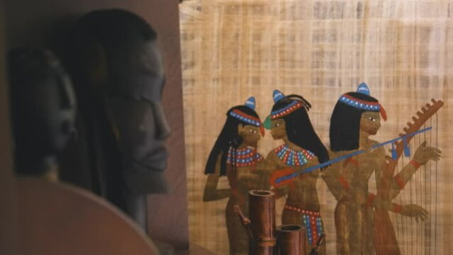Black Stock Footage of historic African Art, Masks, Artifacts, and Sculptures in a home museum showcasing the diversity of African descendents, cultures, and creativity