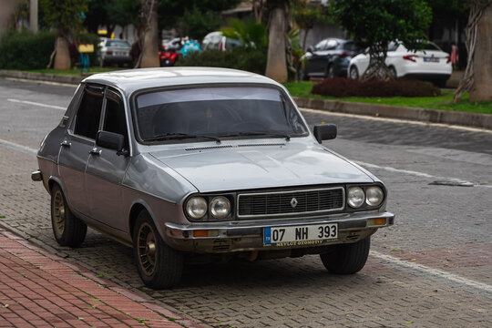 Side , Turkey -  January  27, 2023:     white Renault 12   is parked  on the street on a warm  autumn  day