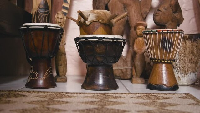Black Stock Footage of historic African Art, Masks, Artifacts, and Sculptures in a home museum showcasing the diversity of African descendents, cultures, and creativity