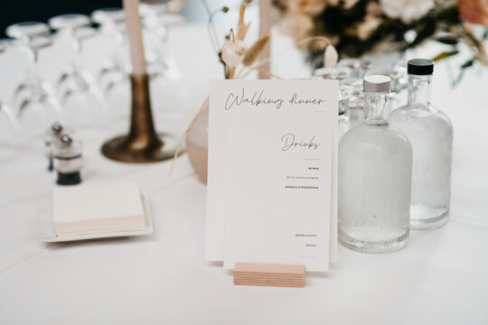 Walking Dinner & Drinks menu on a table indoors