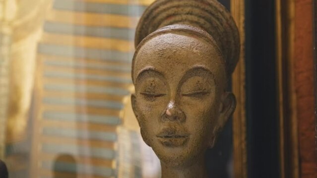 Black Stock Footage of historic African Art, Masks, Artifacts, and Sculptures in a home museum showcasing the diversity of African descendents, cultures, and creativity