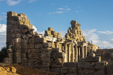 Fototapeta na wymiar An antique ruined city of columns.Ruin. View of the ancient city in Side, Turkey.