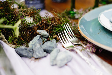 Silverware with juniper