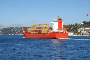 Modern container ship on the Bosphorus, Turkey.