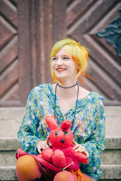 Woman holding a toy