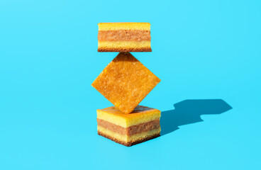 Apple cake slices minimalist on a blue background