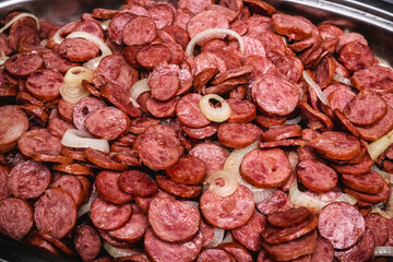 Brazilian fried sausage, with onion and sauce, typical food from Brazil in the state of Minas Gerais