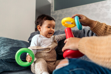 Cheerful Baby Playing with Toys