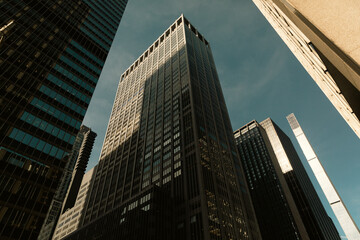 Fototapeta na wymiar low angle view of modern skyscrapers in Manhattan district of New York City.