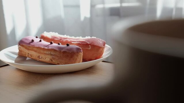 sweet eclairs in glaze in the kitchen against the background of the window
sweet, sugar, dessert, valentine, yummy, tasty, pastry, kitchen, gourmet, fresh, eclair, snack,  delicious, cuisine, cream, 