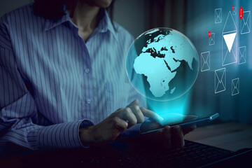 Business woman send E-mail virtual screen technology future wireless network connection over the...