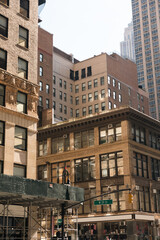 Fototapeta na wymiar different stone and concrete buildings on urban street in New York City.