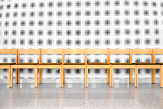 Minimalist interior with row of chairs