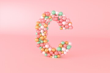 Letter C made of glass balls, pastel pearls, crystal jewels and gold.