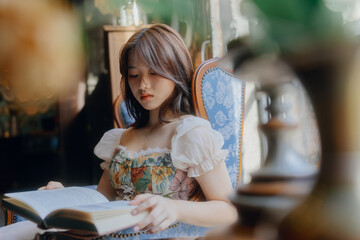 young woman reading a book