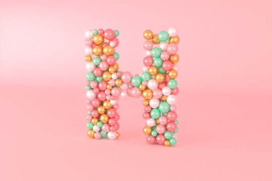 Letter H made of glass balls, pastel pearls, crystal jewels and gold.