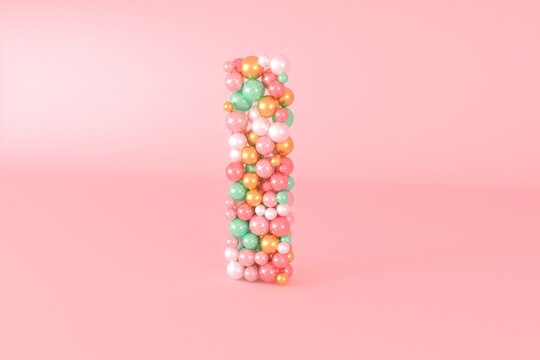 Letter I made of glass balls, pastel pearls, crystal jewels and gold.