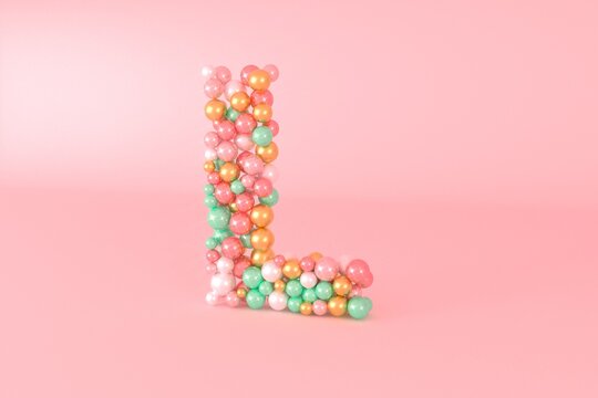 Letter L made of glass balls, pastel pearls, crystal jewels and gold.
