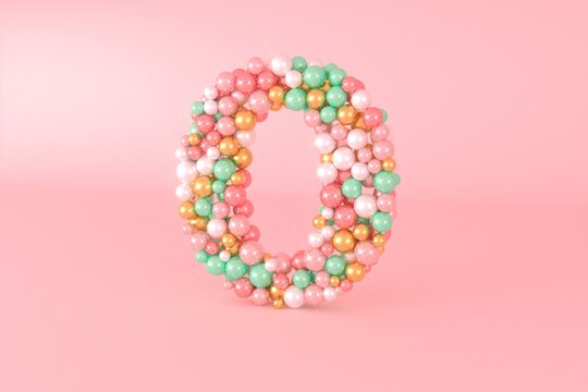 Letter O made of glass balls, pastel pearls, crystal jewels and gold.