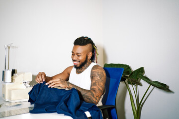 happy small business clothes designer
