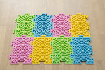 Fototapeta premium Children orthopedic massage mat for flatfoot correction.