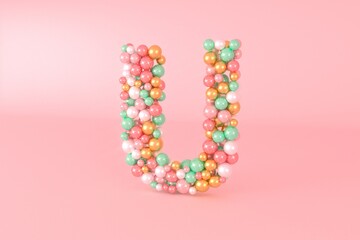 Letter U made of glass balls, pastel pearls, crystal jewels and gold.