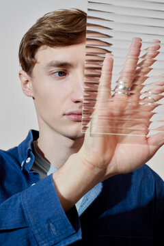 Man Touching The Glass
