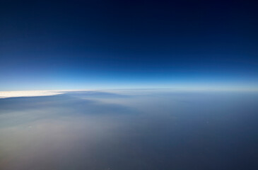 Closeup ethereal dreamy clouds, thousands of miles high in the sky