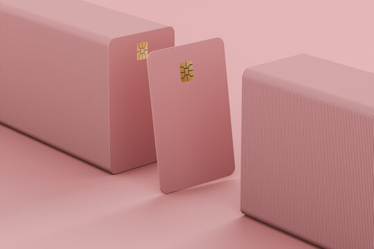 Column of credit cards on pink background