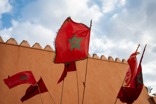Moroccan flags out of a building in Morocco